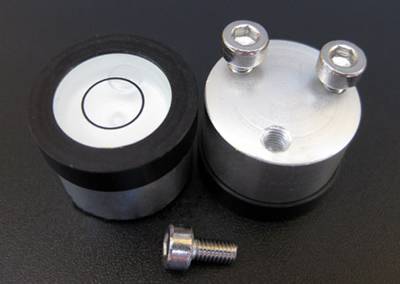 There are two metal bubble level vials with nuts and can screws.